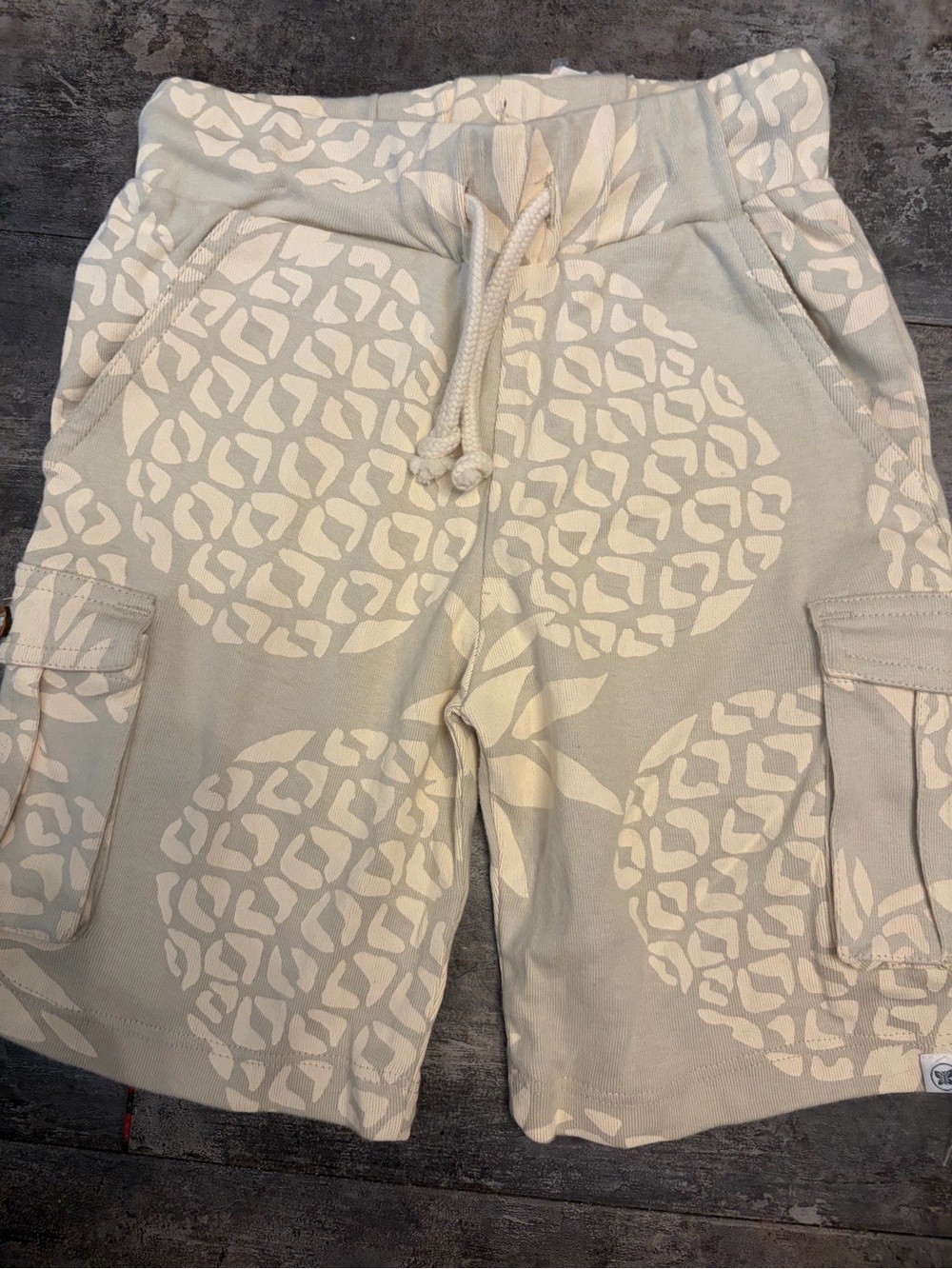 The Honest Company Cream and Light Gray Pineapple Print Kids Cargo Shorts